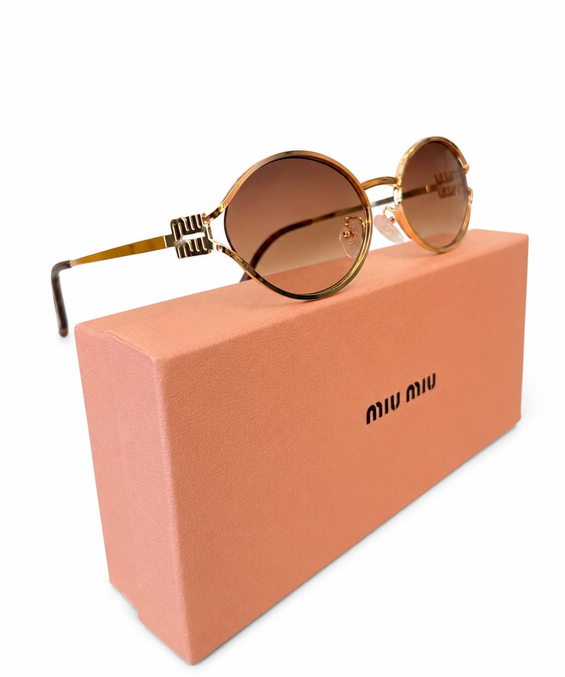 Luxury miumiu Oval shap - light brown lens.
