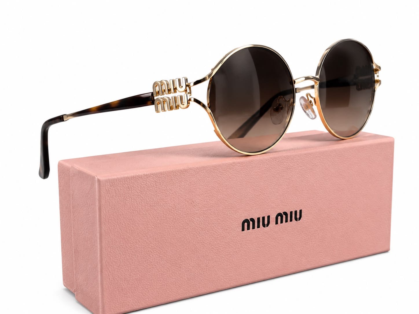 Luxury miumiu Oval shap - brown lens.